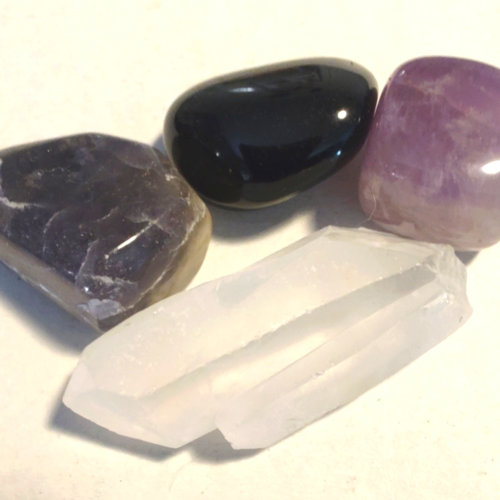 4 crystal starter set. Names and meanings in description. Rare clean Twin point